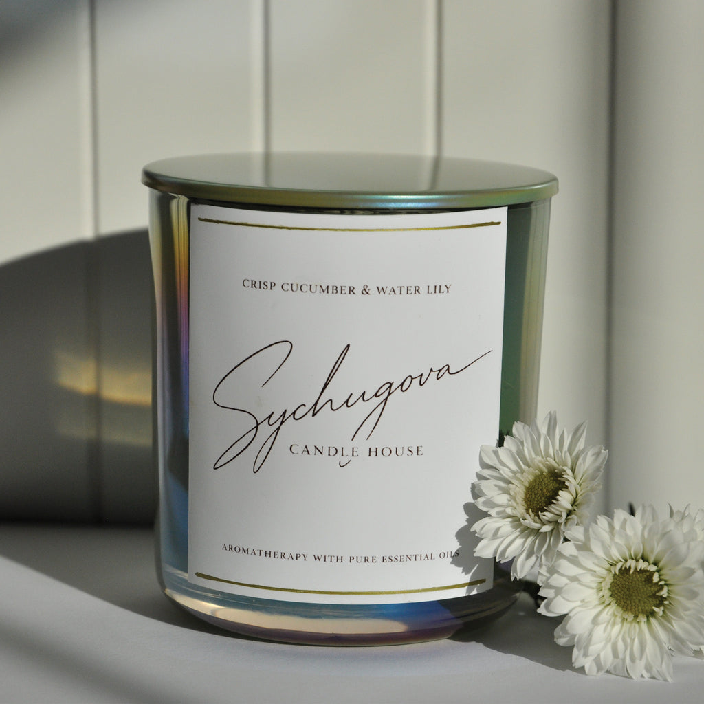 Fresh aquatic green candle with cucumber, waterlily, jasmine, and geranium notes for focus and mental clarity