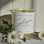 Hand-poured massage candle with shea butter, cocoa butter, jojoba, and squalane for evening skin care